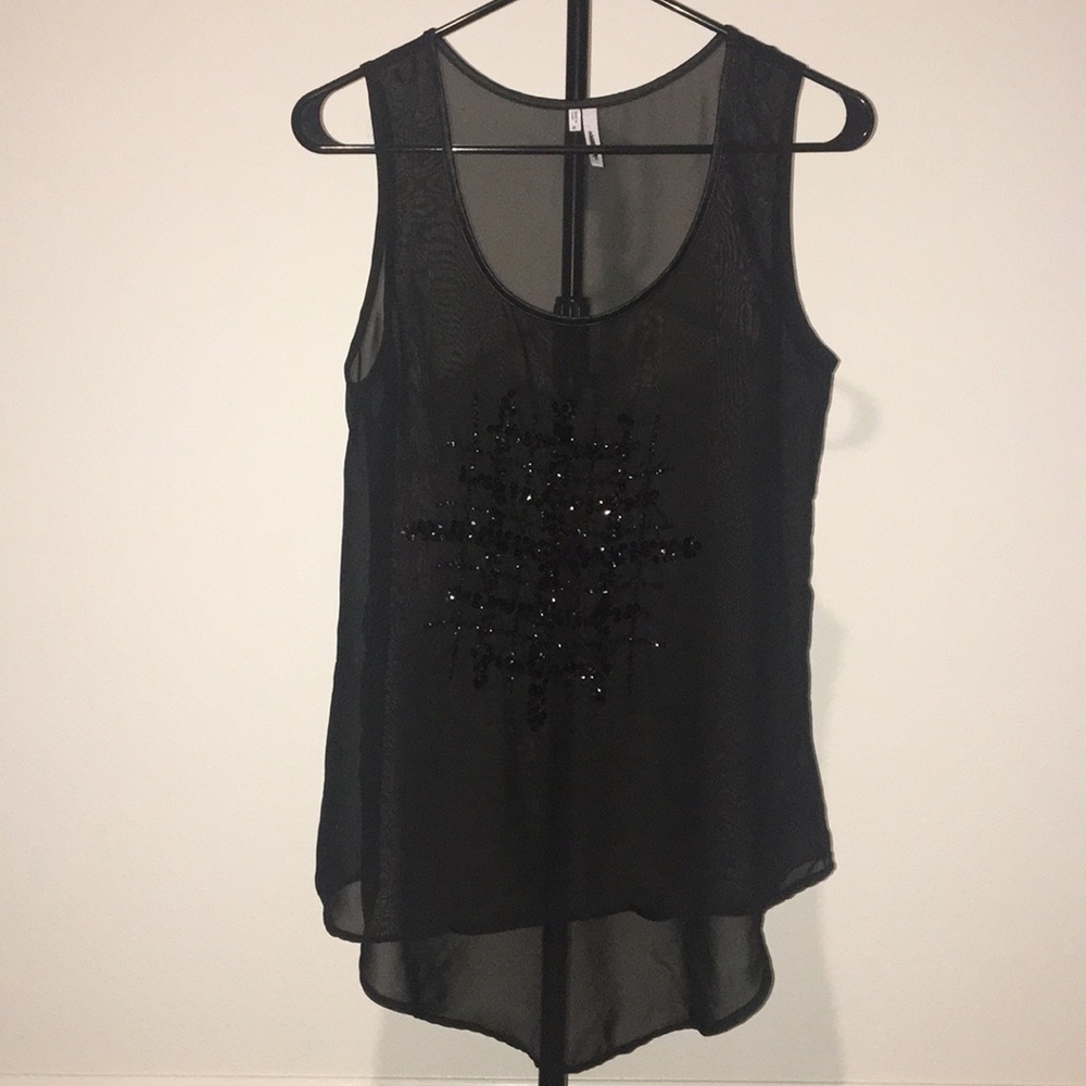 Black blouse with sequins in the middle